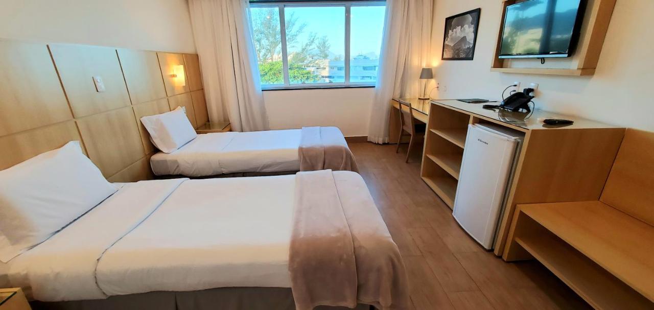 Quarto Twin com Vista Mar Parcial