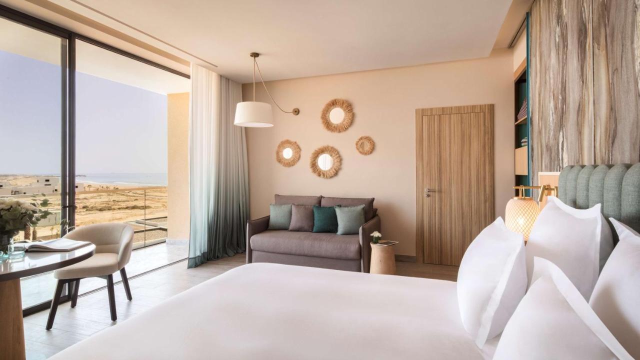 King Suite with Balcony and Partial Ocean View
