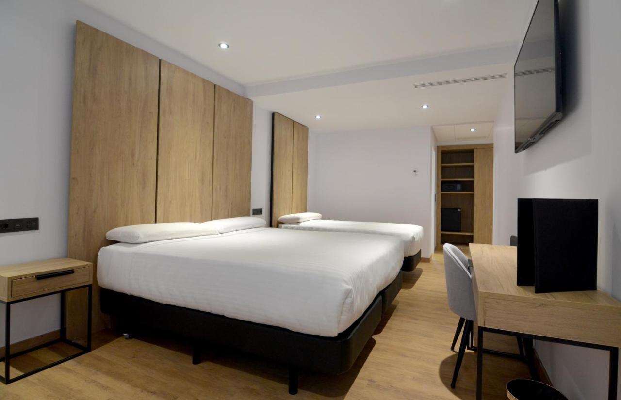 Quarto Twin com Cama Extra