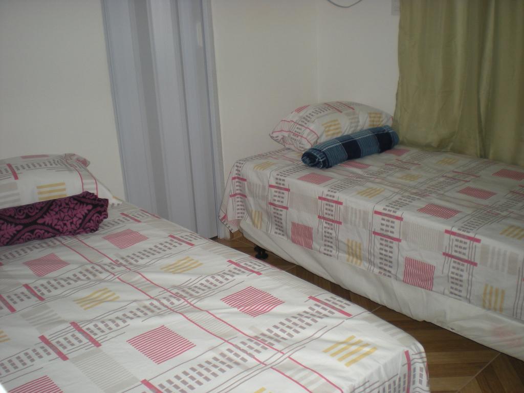 Quarto Duplo