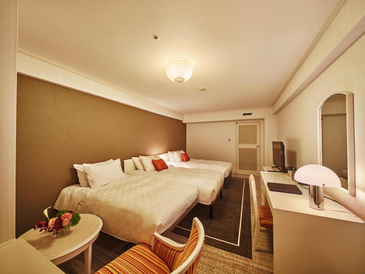 Deluxe Tweepersoonskamer met 2 Aparte Bedden en een Extra Bed - Rookvrij