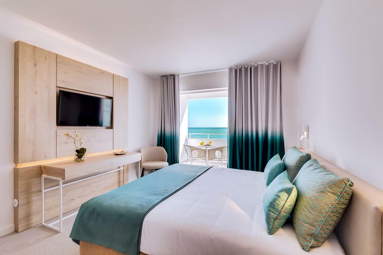 Eenpersoonskamer met Balkon en Uitzicht op Zee.