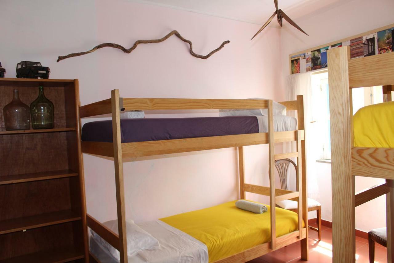 Cama em Beliche num Dormitório Misto