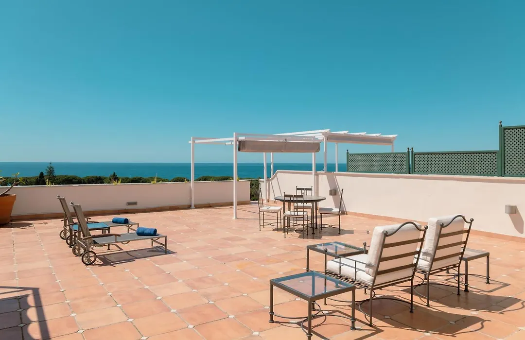 Apartamentos Guadalpin Suites-1