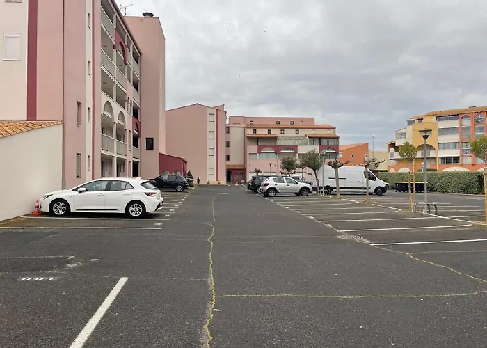 T2 - Les pieds dans le sables en toutes saisons 5 couchages - climatisation - parking privée - piscine - situation optimum et rare - Amoureva - Plage Richelieu- Cap d'Agde