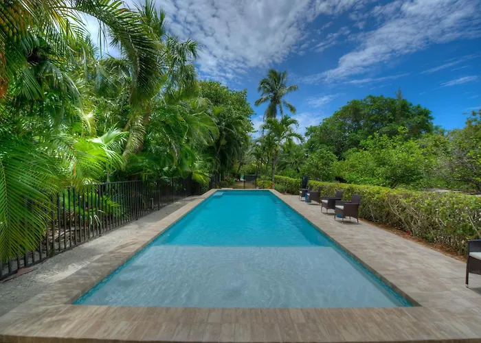 Waterfront Pink House With Private Dock & Pool