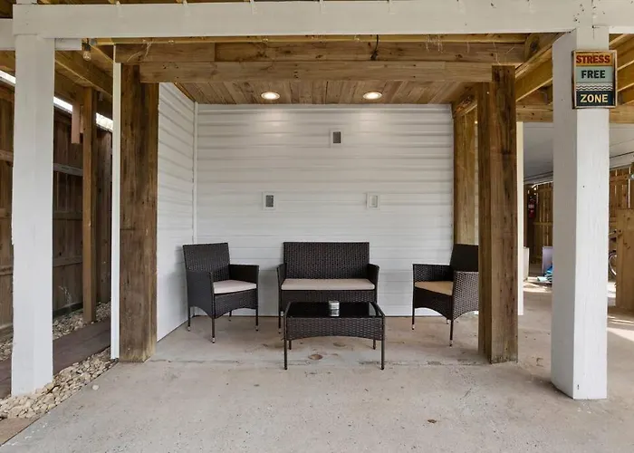 Waterfront Home Game Room Ping Pong Outdoor Bar Area
