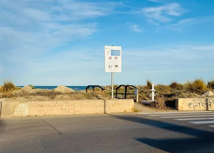 Adosado en la playa con piscina