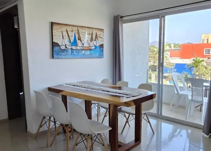 Magnifico Departamento: Beachfront Oasis with Pools and Comfort for 6