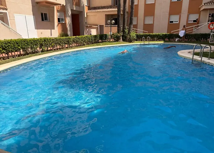 .Apartamento 1a linea de playa + piscina + parking DAIMUS