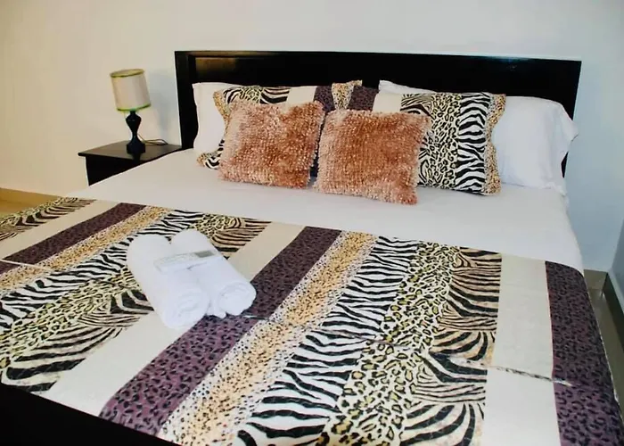 Hotel Coastalbay 2 & Golf Cart Rental
