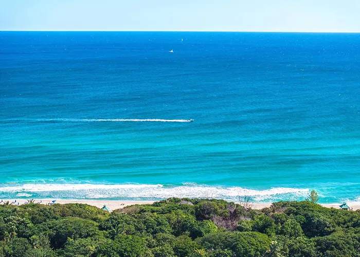 Across From Beach | Balcony • Pool • Parking • 2Br