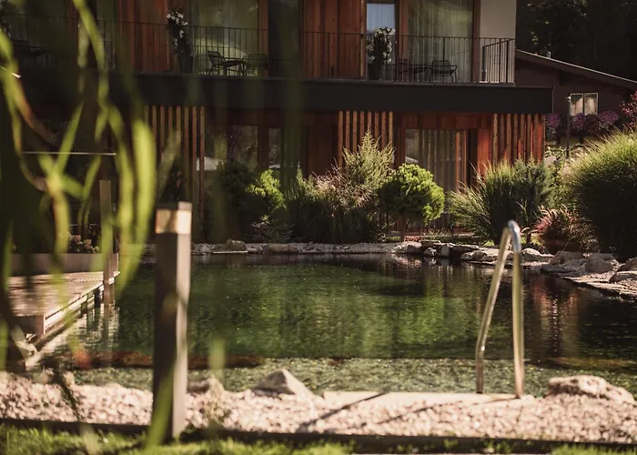 Wellness und Brunch Hotel MorgenZeit beheizter Naturteich Genuss Frühstück bis 13 Uhr Hochkönig Sommercard