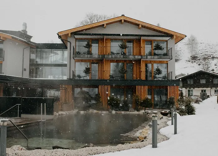 Wellness und Brunch Hotel MorgenZeit beheizter Naturteich Genuss Frühstück bis 13 Uhr Hochkönig Sommercard